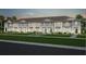 Charming townhomes with manicured lawns offers comfortable and modern living at 16164 Palm Frond Ave, Clermont, FL 34714