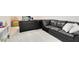Spacious basement with a large sectional sofa, playroom and entertainment area at 1675 Amsel Falls Park Ter, Winter Garden, FL 34787