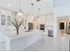 Spacious kitchen featuring white cabinets, a large island, modern appliances, and open layout at 1675 Amsel Falls Park Ter, Winter Garden, FL 34787
