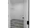 Walk-in closet with wire shelving and luxury vinyl flooring at 17167 Sw 40 Ter, Ocala, FL 34473