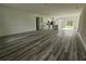 Open-concept living space featuring a modern kitchen and luxury vinyl flooring at 17167 Sw 40 Ter, Ocala, FL 34473