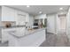 Modern kitchen with stainless steel appliances, granite countertops, and a breakfast bar at 2113 Winnetka Ct, Orlando, FL 32818
