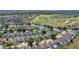 Spacious community homes with screened patios, solar panels, mature trees, and a lush golf course view at 217 Herring St, Davenport, FL 33897