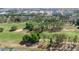 Scenic aerial view of the community golf course, showcasing the lush greenery and well-maintained landscape at 217 Herring St, Davenport, FL 33897
