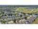Spacious community homes with screened patios, solar panels, mature trees, and a lush golf course view at 217 Herring St, Davenport, FL 33897