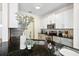 Stylish kitchen with granite countertops, stainless steel appliances, and chic backsplash at 217 Herring St, Davenport, FL 33897