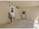 Covered patio with concrete flooring and access door to the home at 220 Palmer Park Ln, Davenport, FL 33897