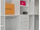This walk-in closet features white shelving with multiple drawers and metal rods at 2306 Hargill Dr, Orlando, FL 32806