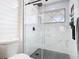 Updated bathroom featuring a glass enclosed shower, black fixtures, and modern tiling at 2329 Shadow View Cir # 2329, Maitland, FL 32751