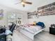 Bedroom featuring a ceiling fan and natural light from the window at 2329 Shadow View Cir # 2329, Maitland, FL 32751