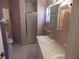 Bathroom featuring a double sink vanity and glass shower at 236 Ridge View Dr, Davenport, FL 33837