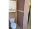 Bathroom featuring a toilet and built-in storage at 236 Ridge View Dr, Davenport, FL 33837