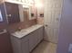 Bathroom featuring a double sink vanity at 236 Ridge View Dr, Davenport, FL 33837