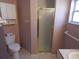 Bathroom featuring a toilet and glass shower at 236 Ridge View Dr, Davenport, FL 33837