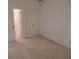 Empty bedroom with neutral carpet and two white doors at 236 Ridge View Dr, Davenport, FL 33837