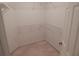 Empty walk-in closet featuring metal racks and carpeted floor at 236 Ridge View Dr, Davenport, FL 33837