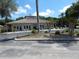 A spacious clubhouse with beautiful landscaping and a circular drive welcomes members at 236 Ridge View Dr, Davenport, FL 33837