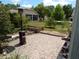 Brick patio with a charming garden and patio heater for outdoor entertaining at 236 Ridge View Dr, Davenport, FL 33837