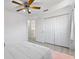 Bedroom with a bed, white rug and a closet at 239 Longhirst Loop, Ocoee, FL 34761