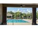 Resort-style community pool with ample seating at 239 Longhirst Loop, Ocoee, FL 34761