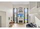 Inviting living room with tall windows, a fireplace, and an open layout perfect for Gathering gatherings at 239 Longhirst Loop, Ocoee, FL 34761
