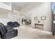 Bright and open living space with tile floors and open floor plan at 239 Longhirst Loop, Ocoee, FL 34761