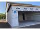 Spacious unfinished garage with attached house and side entry access at 2395 Zuni Road, St Cloud, FL 34771