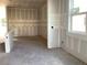 Unfinished kitchen space with exposed walls ready for appliances and personalization at 2395 Zuni Road, St Cloud, FL 34771