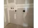 Unfinished laundry room with updated plumbing hookups and newly installed drywall at 2395 Zuni Road, St Cloud, FL 34771