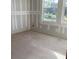 Unfinished room with great light, awaiting personalization and creative design; customize it! at 2395 Zuni Road, St Cloud, FL 34771
