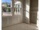 Unfinished room with new windows and natural light; customize this space to suit your needs at 2395 Zuni Road, St Cloud, FL 34771