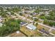 Property aerial displaying the home's backyard and community features with mature tree coverage at 2558 Academy Ave, Deltona, FL 32738