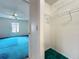 Walk-in closet with wire shelves and a view of the bedroom at 2558 Academy Ave, Deltona, FL 32738