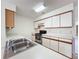 Kitchen view featuring classic appliances and ample counter space at 2558 Academy Ave, Deltona, FL 32738
