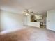 Spacious living room leading to a kitchen area at 2558 Academy Ave, Deltona, FL 32738