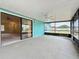 Enclosed outdoor patio offers transition to living area and exterior views at 2558 Academy Ave, Deltona, FL 32738