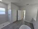 Elegant bathroom featuring a soaking tub, walk-in shower, and contemporary design at 2644 Sw 162 Nd Street Rd, Ocala, FL 34473