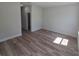 Spacious bedroom with a sleek design, showcasing stylish flooring and a well-lit interior at 2644 Sw 162 Nd Street Rd, Ocala, FL 34473
