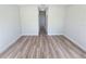Inviting bedroom showcasing a clean design, laminate flooring, and ample space at 2644 Sw 162 Nd Street Rd, Ocala, FL 34473