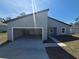 Contemporary one-story home boasting an attached garage and modern exterior at 2644 Sw 162 Nd Street Rd, Ocala, FL 34473