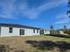 A view of the exterior of the home, highlighting its architectural design and landscaping at 2644 Sw 162 Nd Street Rd, Ocala, FL 34473