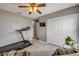 This bedroom has bright lighting from a ceiling fan and closet for storage at 2844 Eagle Lake Dr, Orlando, FL 32837