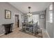 Dining area with a chandelier, neutral walls, and natural light at 2844 Eagle Lake Dr, Orlando, FL 32837