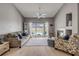 Bright living room features a fireplace and sliding door leading to a private pool area at 2844 Eagle Lake Dr, Orlando, FL 32837
