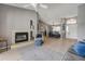Spacious living room featuring a fireplace, hardwood floors, and an open layout to the dining area at 2844 Eagle Lake Dr, Orlando, FL 32837