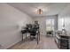 This modern office features natural lighting from a large window at 2844 Eagle Lake Dr, Orlando, FL 32837