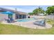 Inviting pool and spa, surrounded by lush landscaping, create a backyard paradise at 2844 Eagle Lake Dr, Orlando, FL 32837