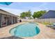 A beautiful backyard pool with a spa and a hammock at 2844 Eagle Lake Dr, Orlando, FL 32837