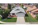 Aerial view of a home, showing the roof and surrounding neighborhood at 3192 Running Deer Path, Kissimmee, FL 34746