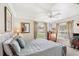 Serene bedroom featuring soft lighting, neutral tones, and large windows at 3192 Running Deer Path, Kissimmee, FL 34746